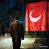 Talat_Pasha_wearing_a_suit_carrying_the_Turkish_flag_watch-Enhanced-Color-Restored.jpg